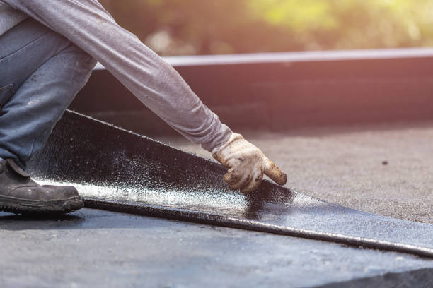 Professional Emergency Waterproofing technician working in Plainfield, WI